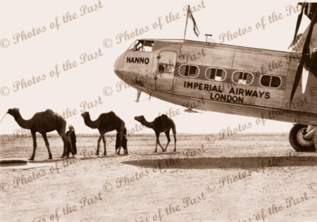 Camels next to Imperial Airways plane,Pakistan,London/Aust air route c1930s