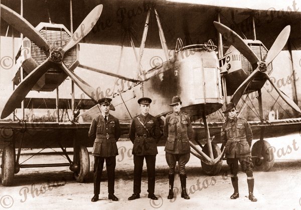 Ross & Keith Smith (left) and mechanics * Vickers Vimy 1920 aerpolane