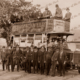 Unusual motor bus with offical male party c1910s