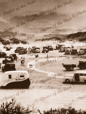 Taking refuge from the bushfire at Anglesea River mouth, Vic. Vicroria. Great Ocean Road 1947 caravans, cars