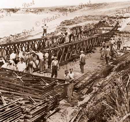 Temporary 'Bailey' bridge being erected Hutt Gully near Anglesea, Vic.1953. Great Ocean Road. Victoria.