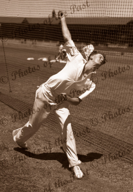 Australian cricketer, Keith Miller bowling in nets. c1940s