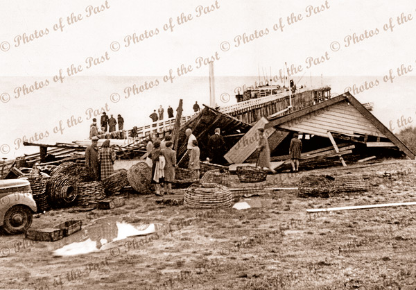 Remains of Hector Stribling's Boatshed blown down by storm. Lorne, Vic. 1946. Pier. Jetty. Great Ocean Road