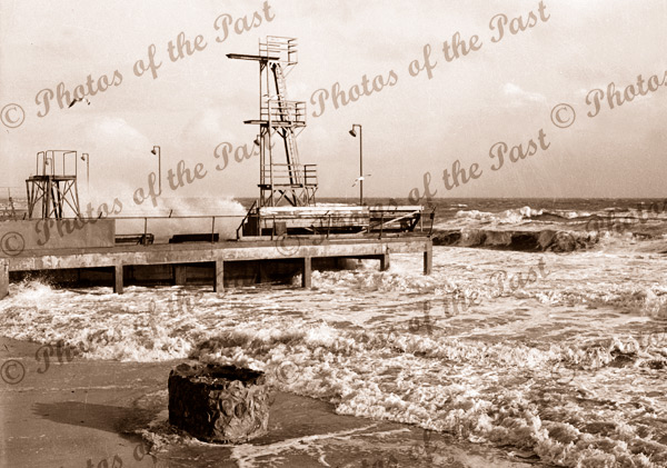 Henley Baths during stormy weather, SA. 1948. Jetty, pier. South Australia