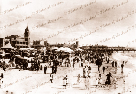 Glenelg Beach, SA. Looking south to jetty and crowds. 1896. South Australia. Carriage