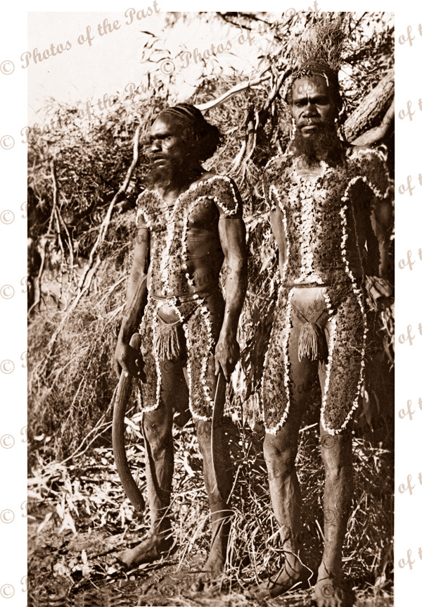 Two Aborigines in traditional dres. Tennant Creek NT. Boomerang. Northern Territory. c1950