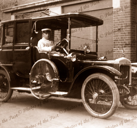 Strange car. Open front closed rear. Army driver, AA plate Taxi? c1910s