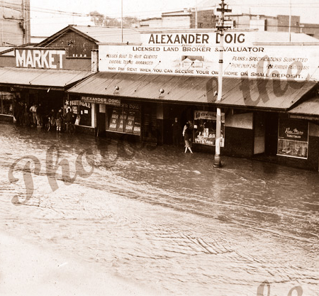 Flooded Unley Road shops, SA. c1950s. South Australia