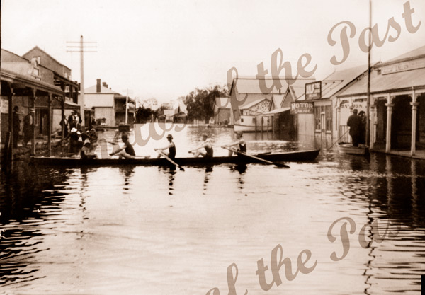 Row boats in flooded main street. Mannum, SA. 1917. Murray River, South Australia.