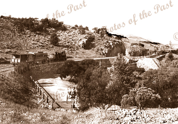 Steam train going through Pichi Richi Pass, SA. 1909. South Australia.