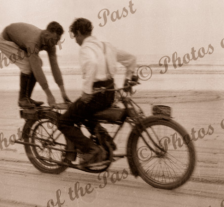 Sellicks Beach Motor Bike trials, SA. Stunt riding, Ken Ragless standing. Oswald Sitting. c1925. South Australia. Racing