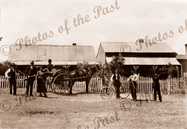 Gun group outsides houses at Goolwa SA. South Australia. c1910. Horse and carriages
