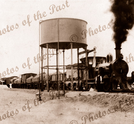 Steam train watering at Natimuk Station. Vic.1907. Rail. Victoria. Water tank