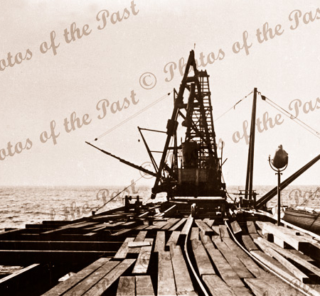 Construction of Rapid Bay Jetty, SA. Showing pile driver. C1940s. South Australia. Pier