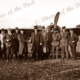 Harry Kauper & Harry Butler (in uniforms) with members of the press at Northfield SA 31 July 1919. Airplane. South Australia.