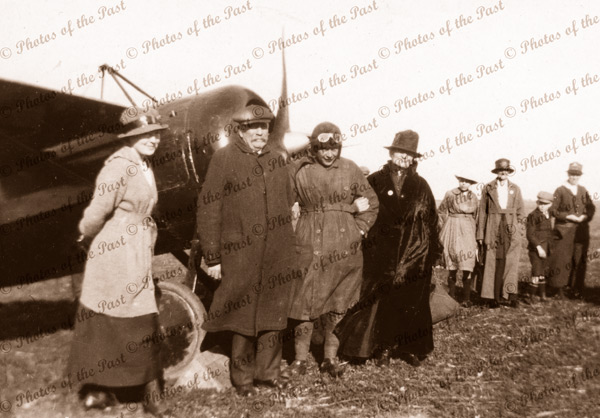 Butler (centre) at Minlaton, SA after first flight across Gulf St Vincent. Flanked by father,mother and sister Ann Maria. Taken prior to return trip to Adelaide 11 August 1919. South Australia. Aviator