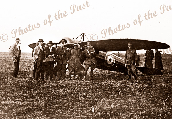 Unknown person, Fred Richards, Tom Butler, H. Kauper, H. Butler, Cecil Crawford & Ken Cook next to Bristol M1c monoplane. 1919