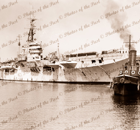 HMAS VENGEANCE Arriving at Melbourne, Victoria. Tug EAGLE. 1953