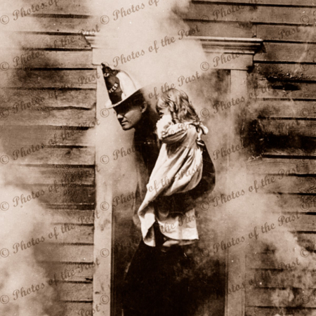 The Rescue (Fireman rescues child) from burning building. c1900. girl