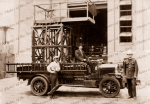 Fire or pole maintenance truck with elevating platform, c 1910s