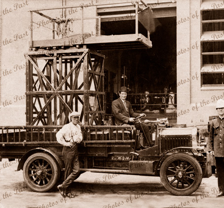 Fire or pole maintenance truck with elevating platform, c 1910s