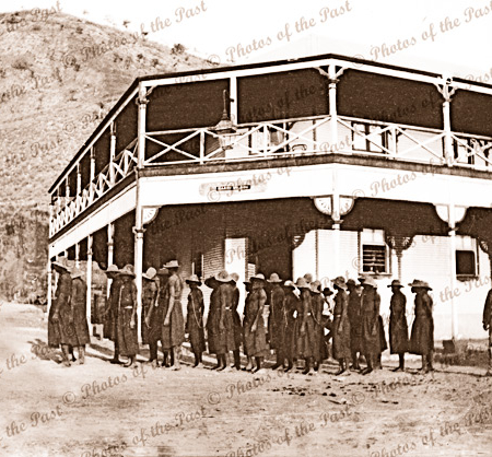 Unknown hotel with aborigines in chains. North WA? 1910s