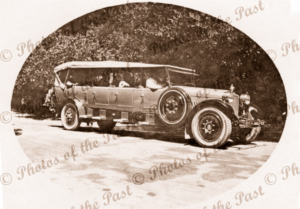 A long motor car. A Cherabang? 1920s