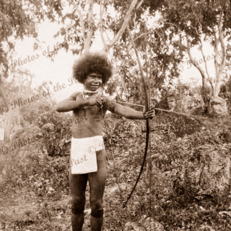 Papuan lad with bow and arrow. Papua New Guinea