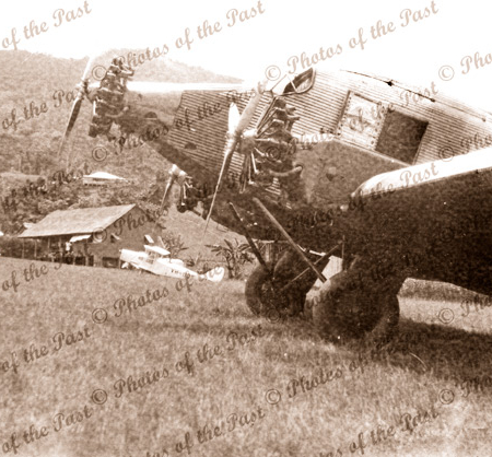 Junkers aircraft on unknown airstrip, Papua New Guinea #1 c1950s?