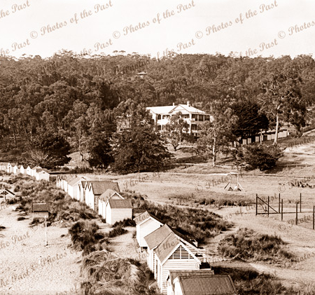 Bathing boxes along the foreshore at Lorne, Victoria. c1920s