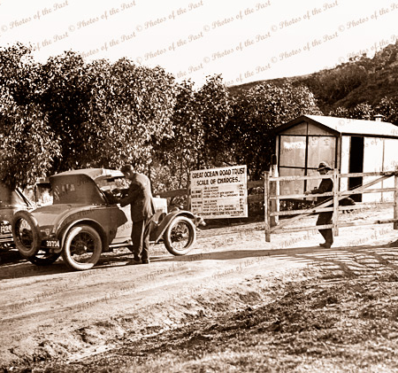 Cars at the first toll gate located between the Devils Elbow and Grassy Creek on the Great Ocean Road. Victoria. c1920s