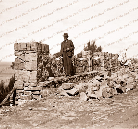 Bluestone wall under construction at Mt. Defiance. Great Ocean Road. Vic. c1930s