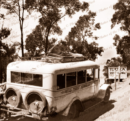 Birtle's Tourist Services bus (De Dion Bouton) on the Melbourne - Geelong & Lorne route stopped at Iluka Rest Home, Big Hill, Great Ocean Road. c1920s-1930s