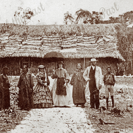 Reverend Morrison's house, Efate, New Hebrides. (Vanuatu). Shows the Reverend with 2 ladies & 3 natives. c1864